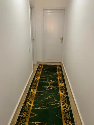 an empty hallway with a rug on the floor at Tala 1 in Hurghada