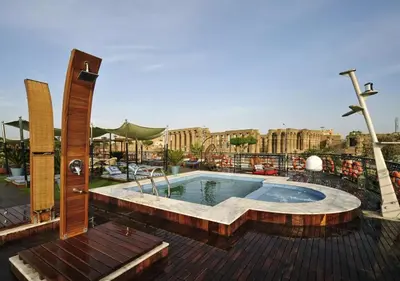 a swimming pool on top of a building at Luxor Or Aswan Nile Cruise, Ultra Deluxe Cruises sailing 3, 4, Or 7 Nights in Luxor