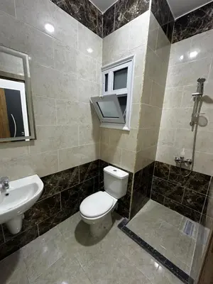 a bathroom with a toilet and a sink at Wonderful sea view studio in Hurghada