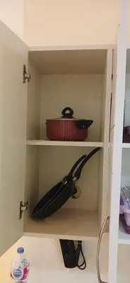 a shelf with a pot and a bowl on it at Florenza Khamsin Hurghada in Hurghada