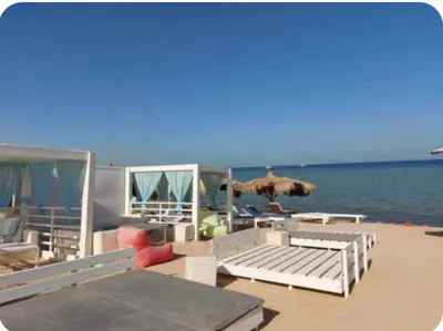 a house on the beach with a view of the ocean at Selena bay resort in Hurghada