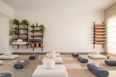a room with couches and chairs on a floor at MGM Wellness Retreat in Aswan