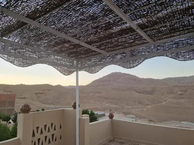 a view from the roof of a building in the desert at House Mountain Luxor - Villa for rent in Luxor