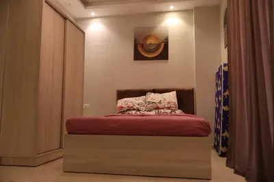 a bedroom with a bed in a room at Cosy studio Florenza khamsin in hurghada in Hurghada