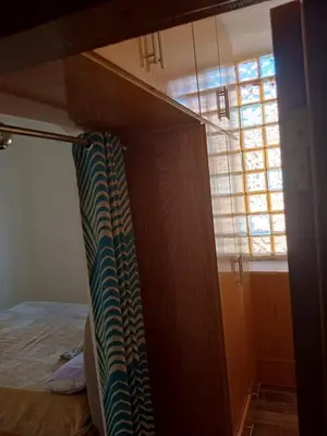 a bedroom with a bunk bed and a window at City centre Carrefour in Hurghada