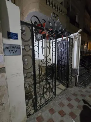 a black gate with a bunch of hearts on it at شقة لاروز الغردقه الكوثر القديم شارع النور عماره لاروز in Hurghada