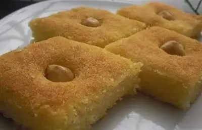 a group of donuts on a white plate at Lucky in Luxor