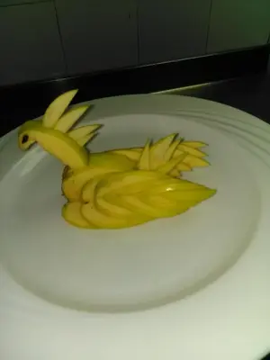 a pile of sliced bananas on a white plate at Lucky Nile Tours in Luxor