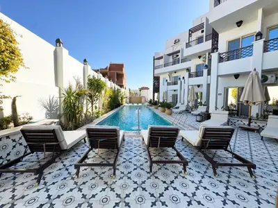 an image of a swimming pool at a villa at Arаbian Suites by Imperial in Hurghada