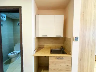 a small bathroom with a sink and a toilet at Apartment Aldau in Hurghada