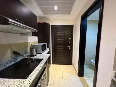 a kitchen with a sink and a counter top at Aldau Maxico in Hurghada