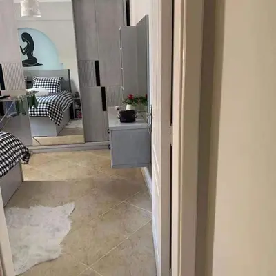 a view of a room with a mirror and a table at West Side B 1 2 in Hurghada