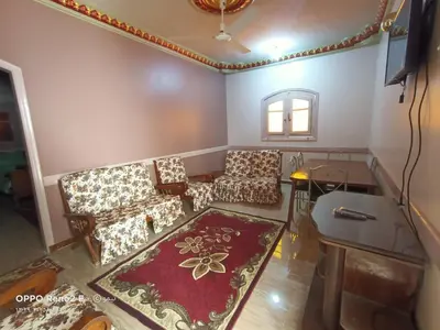 a living room with a couch and chairs and a table at elqusier redsea in Quseir