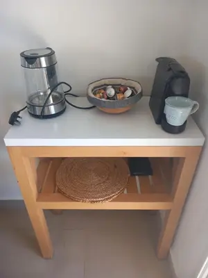 a table with a bowl of food and a blender at Blue Lagoon View - 2 Bed 2 Bath - Shared Pool - El Gouna in Hurghada