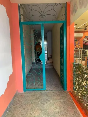 a doorway into a store with a glass door at 2 Bedroom in Andreas Residence in Hurghada