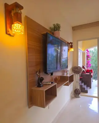 a living room with a flat screen tv on a wall at Veranda sahl hasheesh in Hurghada