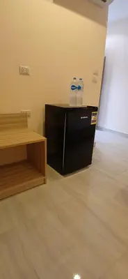 a room with a counter and a table in a room at Lilyland Beach Resort & Waterpark in Hurghada