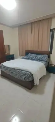 a bedroom with a bed in a room at Apartment for rent in Hurghada