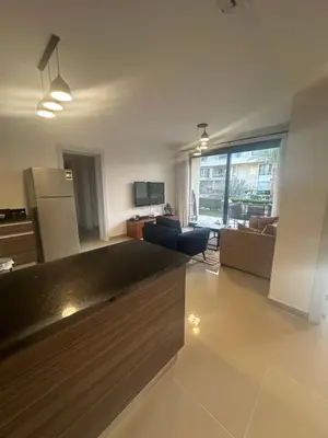 a large living room with a kitchen and a living room at G Cribs Hotel Apartment 2BR in Hurghada
