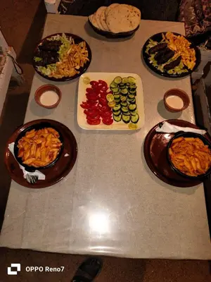 a table with many plates of food on it at Torya guesthouse in Aswan