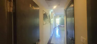 an empty hallway with a hallway leading to a room at Beachfront Resort Seaview Haven Modern Near Airport in Hurghada
