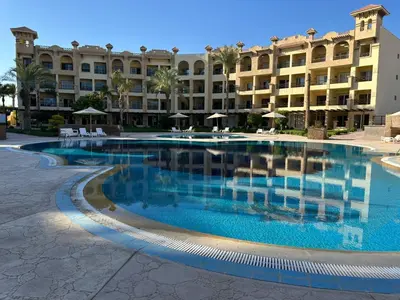 a large swimming pool in front of a building at Al Saraya Sahl Hasheesh by Peaks Studio with Pool View C106 in Hurghada
