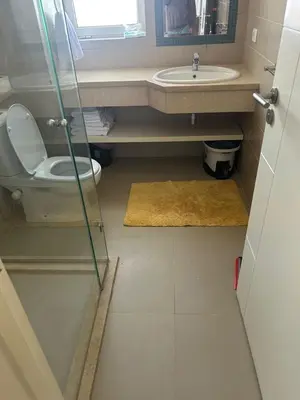 a bathroom with a toilet and a sink at El Gouna 1 Bedroom Waterside in Hurghada