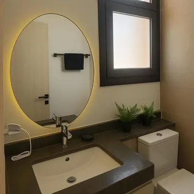 a bathroom with a sink and a mirror at Duplex 1BR King Bed and1 Sofa Bed By the Pool in Hurghada