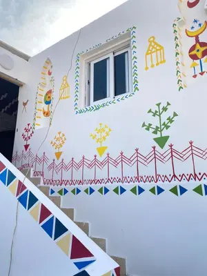 a room with a mural on the wall at Maleka nubian guest house in Jazīrat Suhayl