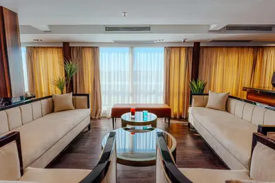 a living room with couches and a table at Savoy Yacht - Exclusive Nile Cruise from Luxor to Aswan in Luxor