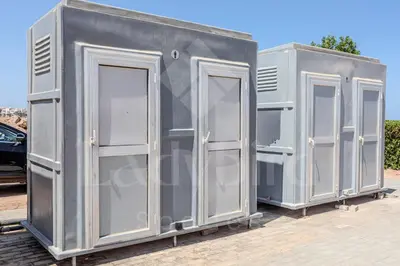 a couple of gray portable toilets sitting next to each other at Ladybird - Veranda Nest in Hurghada
