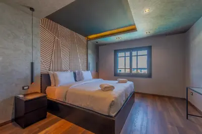 a bedroom with a large bed and a window at Sahlhasheesh villa with heated pool and Jacuzzi in Hurghada