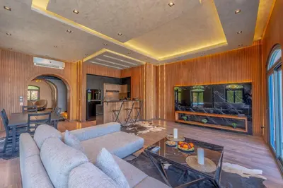 a living room with a couch and a table at Sahlhasheesh villa with heated pool and Jacuzzi in Hurghada