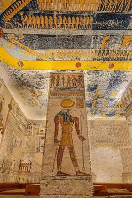 a room with a painting of aaraoh on the ceiling at Desert Rose in Luxor