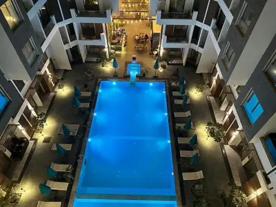 an overhead view of a pool in a apartment building at Imperial resort Hurghada, 1 bedroom luxury resort in Hurghada