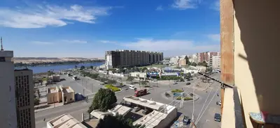 a view of a city with buildings and a street at Downtown Apartment in Aswan