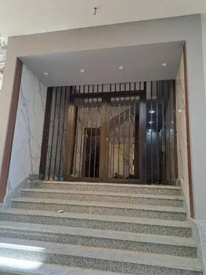 a set of stairs leading up to a building at Amazing Roof In Marina Hurghada in Hurghada