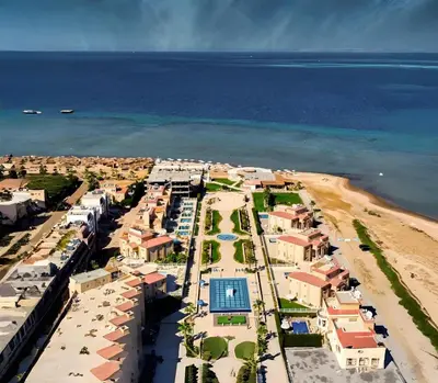 an aerial view of a resort on the beach at Arena Beach Resort - Premium Suites in Hurghada