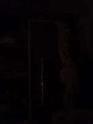 a dark room with a window in the dark at السقالة ميدان اكا in Hurghada