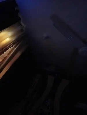 a dark room with a coke bottle in the dark at السقالة ميدان اكا in Hurghada