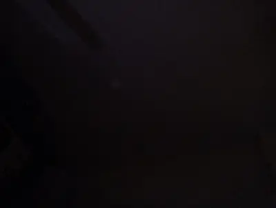 a dark room with a black background at السقالة ميدان اكا in Hurghada
