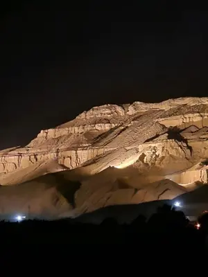 a view of a mountain at night at Villa Saeed in Al Karnak