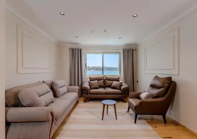 a living room with a couch and two chairs at Anoush Dahabiya 7 nights from Luxor to Luxor each Monday in Luxor