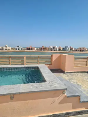 a swimming pool on the roof of a house at El Gouna - 3 Bedroom - Rooftop-Pool - Ancient Hills in Hurghada