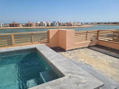 a swimming pool on the roof of a house at El Gouna - 3 Bedroom - Rooftop-Pool - Ancient Hills in Hurghada