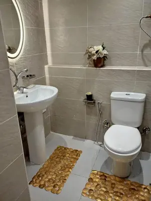 a bathroom with a toilet and a sink at Florenza khamsin Resort Hurghada Red Sea in Hurghada