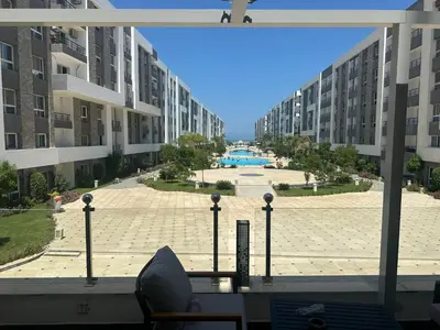 a view of a courtyard from a window of a building at فنادير باي in Hurghada