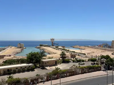 a view of a beach with the ocean in the background at Arabia Sea View in Hurghada