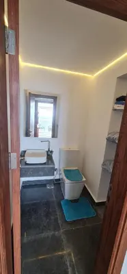 a bathroom with a toilet and a sink at The dune Terrace in Hurghada