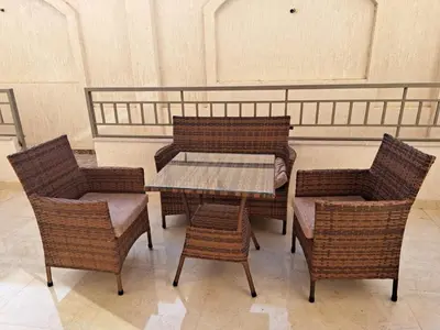 a table and two chairs and a table with a table and chairs at Zafira Apartman in Hurghada